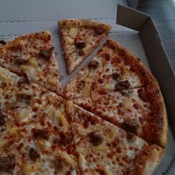 Domino's Pizza - Supposedly a Italian sausage and pineapple with extra cheese pizza