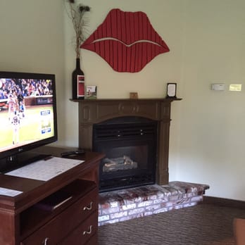 Paso Robles Inn - Fireplace Suite. Troublemaker Wine was the theme - the red lips are their trademark. - Hotels Near Me - Paso Robles, California Paso Robles Inn - Fireplace Suite. Troublemaker Wine was the theme - the red lips are their trademark. - Hotels Near Me - Paso Robles, California