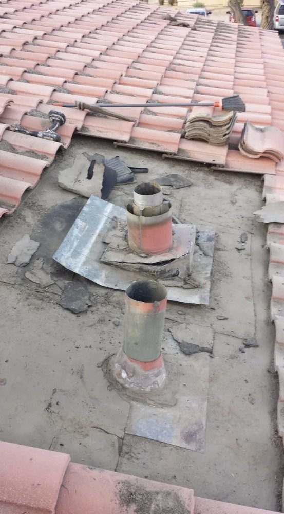 Slide of Romero's Roofing