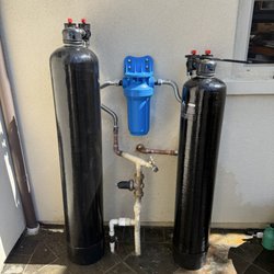 Plumbing Installs - Springwell salt free filtration system installation outside