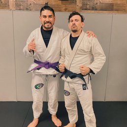 Receiving my Purple belt from Head Coach Michael Souza. Receiving my Purple belt from Head Coach Michael Souza.