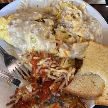 Cozy Egg Cafe - Three Meat Omelette with sausage gravy and sour dough bread. - Cafes Near Me - Mattawan, Michigan