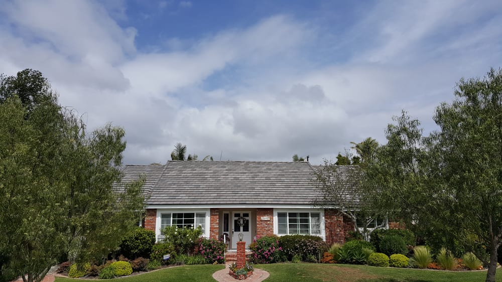 Slide of RC Roofing Co