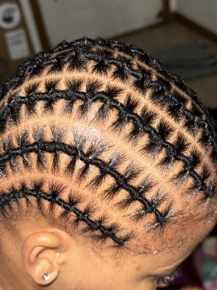 African Braids by Sne Logo