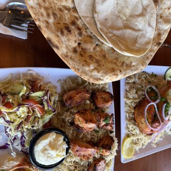 Al-Hadara Restaurant & Cafe مطعم وكافية الحضارة - Left: #83 Shish Tawook Right: #56 Mandi Chicken Side of pita bread - Mediterranean Near Me - Fresno, California