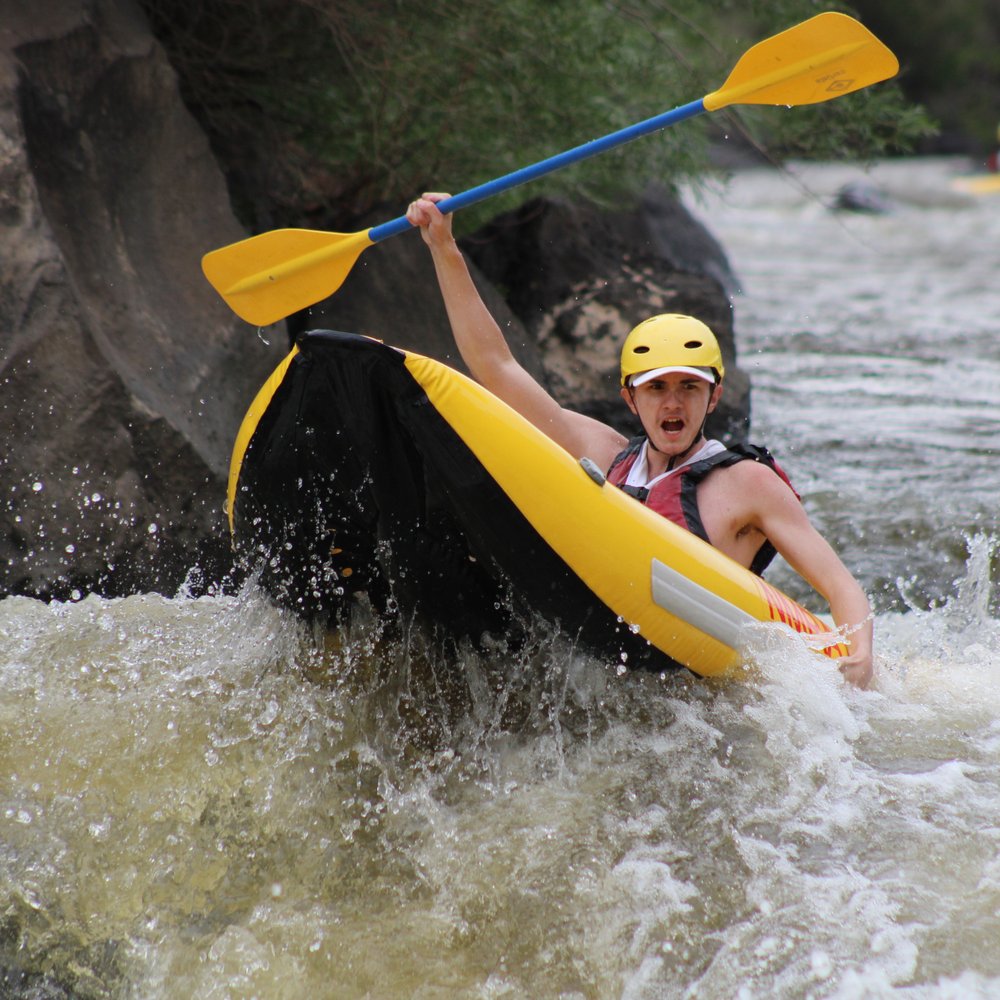 New Mexico River Adventures - Keep your hands on your oar!  Awesome picture though!  :) - Rafting/Kayaking Near Me - Embudo, New Mexico