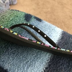 Howie's Family Restaurant - My flip flop shoe to show that my flip flop is thicker the steak I received
