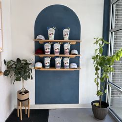 Parousia Coffee - Merch & coffee wall