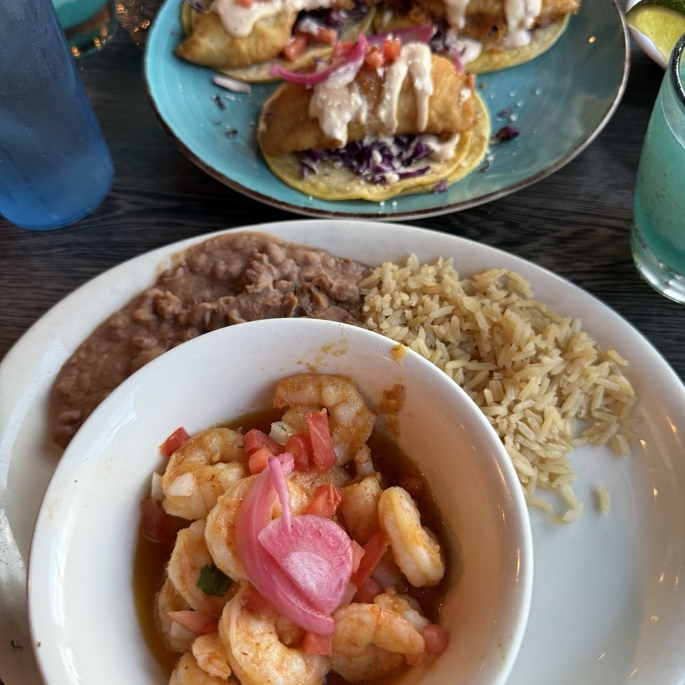 Baja fish tacos and a Chipolte garlic and butter shrimp. Baja fish tacos and a Chipolte garlic and butter shrimp.