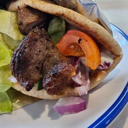 Mr. Greek - Pork Souvlaki on a Pita https://www.instagram.com/the.wanderin.foodie/