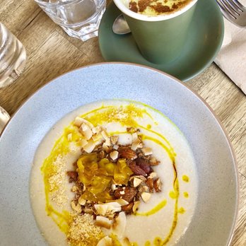 Wilde & Co Cafe - Quinoa oatmeal with pears & nuts. Plus turmeric latte! - Cafes Near Me - Darlinghurst, NSW