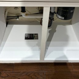 The entire bottom board was removed, the cabinet deep cleaned and a new bottom installed.