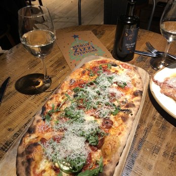 Zizzi - The pizza is huge! Definitely shareable! So good! I got the spicy pizza, it was delish! - Italian Near Me - St Katherines Dock, LND Zizzi - The pizza is huge! Definitely shareable! So good! I got the spicy pizza, it was delish! - Italian Near Me - St Katherines Dock, LND