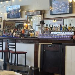 Main Street Sports Bar And Grill - Vintage bar with all top shelf liquors eight different beers on tap and almost 30 different beers available.