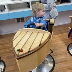 Fun Kuts - Before the hair cut. My son chose the boat out of the car, boat and train.