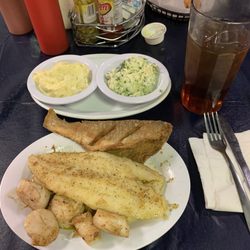 Fried Crocker and grilled catfish and grilled scallops and slaw and potato salad and tea Before