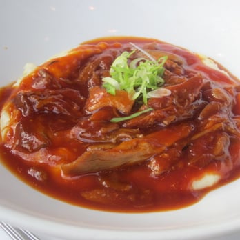 Noah's - Pulled duck BBQ over smoked cheddar polenta - New American Near Me - Greenport, New York Noah's - Pulled duck BBQ over smoked cheddar polenta - New American Near Me - Greenport, New York