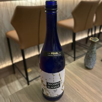X Sushi - Momokawa Sake Pearl (jun gin Nigori) - Sushi Bars Near Me - Winter Garden, Florida X Sushi - Momokawa Sake Pearl (jun gin Nigori) - Sushi Bars Near Me - Winter Garden, Florida