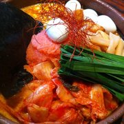 Photo of Ramen Dojo - San Mateo, CA, United States. Spicy roe with kimchi, bamboo, quail eggs, corn and chasu
