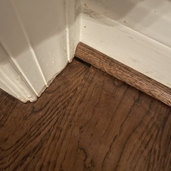 Adams Carpet One Floor & Home - Wood flooring doesn't go to the wall allowing air to seep into the house from the crawl space - Carpeting Near Me - Wilson, North Carolina Adams Carpet One Floor & Home - Wood flooring doesn't go to the wall allowing air to seep into the house from the crawl space - Carpeting Near Me - Wilson, North Carolina