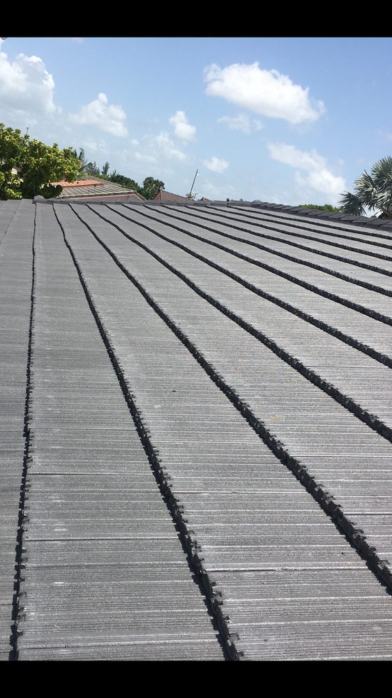 Slide of Excellence Roofing