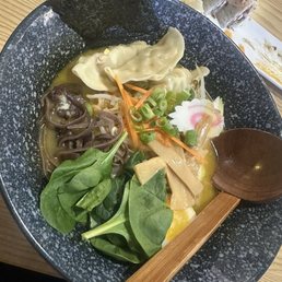 Dumpling ramen with curry base. I chose to exclude cilantro.