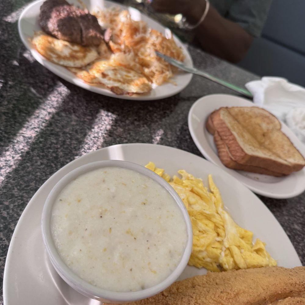 Breakfast-- fish and grits. Breakfast-- fish and grits.