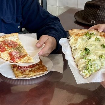 J & D Pizza - Holding a Margarita and Broccoli slice with a Grandma slice on the table - Pizza Near Me - Rego Park, New York J & D Pizza - Holding a Margarita and Broccoli slice with a Grandma slice on the table - Pizza Near Me - Rego Park, New York