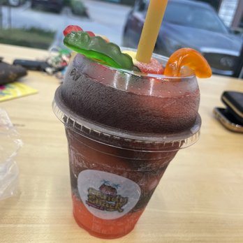 Candy Shack Daiquiris - a drink in a plastic cup - Drive-Thru Bars Near Me - Missouri City, Texas
