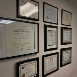 Smiles Divine - Dr. Tobias' Credentials