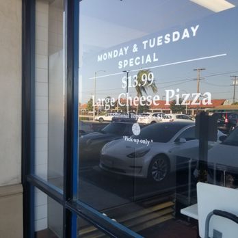 Valentino's Pizza - Monday and Tuesday special is Large cheese pizza - Pizza Near Me - Huntington Beach, California Valentino's Pizza - Monday and Tuesday special is Large cheese pizza - Pizza Near Me - Huntington Beach, California