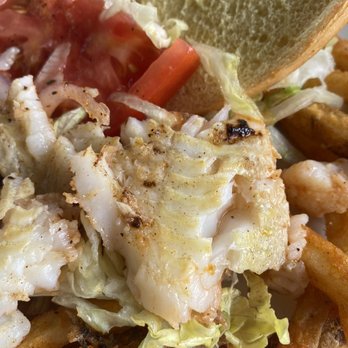 Bridge Tender Inn - Raw fish . Not a blackened grouper. - Seafood Near Me - Bradenton Beach, Florida Bridge Tender Inn - Raw fish . Not a blackened grouper. - Seafood Near Me - Bradenton Beach, Florida