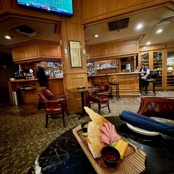 Churchill Bar - Charcuterie and Bronco's football - Cocktail Bars Near Me - Denver, Colorado