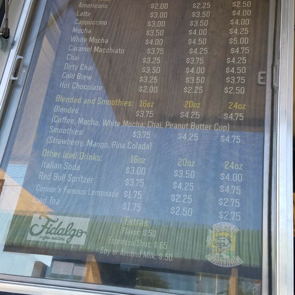 Brewed Awakening - a menu in a window - Coffee & Tea Near Me - Tucson, Arizona