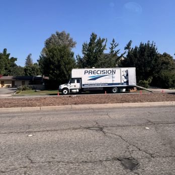Precision Moving & Storage - Even in this busy street, they manage to make it work without blocking the driveway. - Movers Near Me Precision Moving & Storage - Even in this busy street, they manage to make it work without blocking the driveway. - Movers Near Me