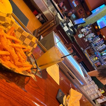 Tilted Kilt Pub & Eatery - Garlic fries and Jaclyn communicating with her customers making sure we are good 2 go - Pubs Near Me - Prince George, Virginia Tilted Kilt Pub & Eatery - Garlic fries and Jaclyn communicating with her customers making sure we are good 2 go - Pubs Near Me - Prince George, Virginia