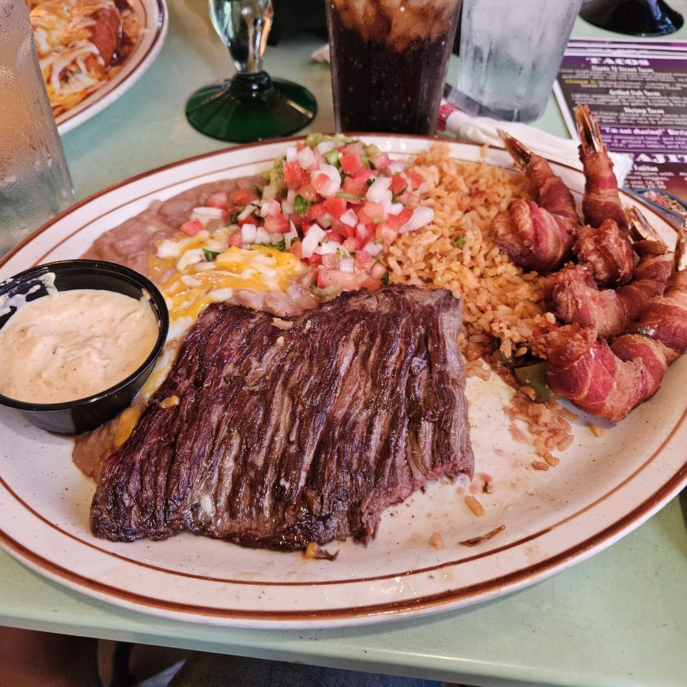 Steak and shrimp plate with cancun sauce