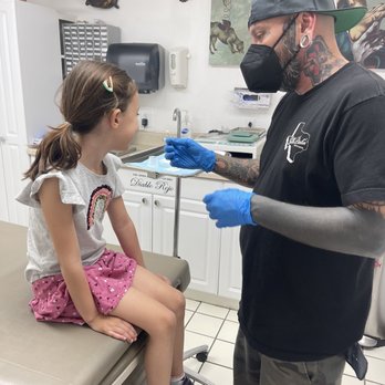 Diablo Rojo Tattoo & Piercing - Andy prepping my 6 year old for her ear piercing. - Tattoo Near Me - Austin, Texas Diablo Rojo Tattoo & Piercing - Andy prepping my 6 year old for her ear piercing. - Tattoo Near Me - Austin, Texas