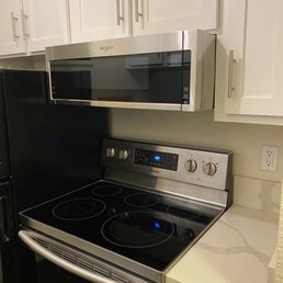 Outlet and over the range microwave installation