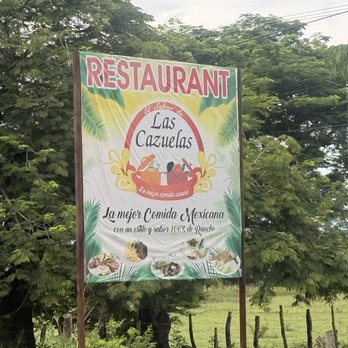 Las Cazuelas - Sign across the road from the restaurant. - Mexican Near Me - Garra de Cuero, JAL
