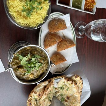 Namaste Garden - 3. Garlic Naan, 4. Aloo Tikki, 20. Chana Saag, 4. Mint Chutney, 5. Mango Chutney, 6. Tamarind Chutney - Indian Near Me - Essex Junction, Vermont Namaste Garden - 3. Garlic Naan, 4. Aloo Tikki, 20. Chana Saag, 4. Mint Chutney, 5. Mango Chutney, 6. Tamarind Chutney - Indian Near Me - Essex Junction, Vermont