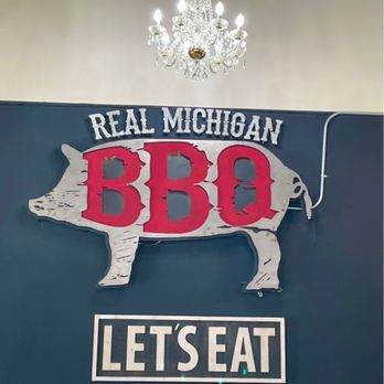 Johnny V's Smoke Shack - Fun, open-ceiling decor with a variety of fancy chandeliers and funny signs. - Barbeque Near Me - Perry, Michigan Johnny V's Smoke Shack - Fun, open-ceiling decor with a variety of fancy chandeliers and funny signs. - Barbeque Near Me - Perry, Michigan