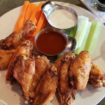 Fat City Kitchen - dry rub wings with a side of sweet - hot sriracha sauce, ranch dressing, celery and carrot sticks - American Near Me - Alexandria, Virginia Fat City Kitchen - dry rub wings with a side of sweet - hot sriracha sauce, ranch dressing, celery and carrot sticks - American Near Me - Alexandria, Virginia