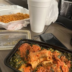 Mama Put Restaurant - My lovely meal: Medium Efo Riro Soup, Jollof Rice, Soda. But no pounded yam, fork or napkin.