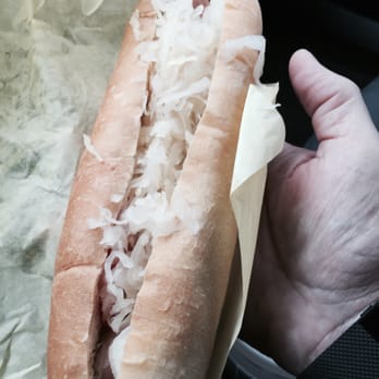 The Hotdogger - Kraut Dog. There is a hot dog, tomato, onion and a sweet onion mustard in there somewhere. - Hot Dogs Near Me - Davis, California The Hotdogger - Kraut Dog. There is a hot dog, tomato, onion and a sweet onion mustard in there somewhere. - Hot Dogs Near Me - Davis, California