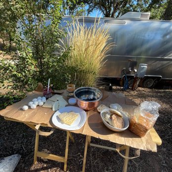 AutoCamp Yosemite - Setting up some food outside - Hotels Near Me - Midpines, California AutoCamp Yosemite - Setting up some food outside - Hotels Near Me - Midpines, California
