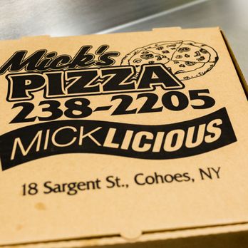 Mick's Pizza - a pizza box on a conveyor belt - Pizza Near Me - Cohoes, New York
