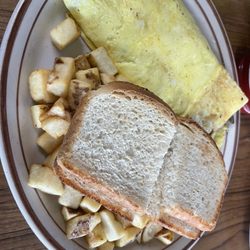 River City Diner & Smokehouse - Wisconsin farmers omelette.  Packed full. Delicious.
