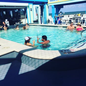 Float Pool & Patio Bar - Getting the party started on a nice summer late morning - Bars Near Me - Galveston, Texas