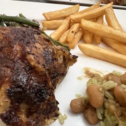 Chicken, green beans, rice and beans and fries Chicken, green beans, rice and beans and fries